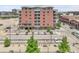 Exterior of a well-maintained brick apartment building with on-site parking for residents at 2229 Blake St # 505, Denver, CO 80205