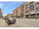Modern brick apartment building on a city street, near attractions and amenities at 2229 Blake St # 505, Denver, CO 80205