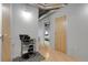Apartment hallway with hardwood floors, leading to various rooms and amenities at 2229 Blake St # 505, Denver, CO 80205