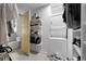 Bathroom with a stackable washer/dryer and storage at 2229 Blake St # 505, Denver, CO 80205
