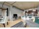 Open-concept living area featuring a breakfast bar, dining area and entertainment center at 2229 Blake St # 505, Denver, CO 80205