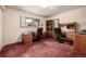 Spacious bedroom featuring two desks and chair sets perfect for a home office setup at 5365 W Princeton Dr, Denver, CO 80235