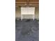 Single-car garage with storage cabinet, concrete floors and overhead lighting at 705 S Alton Way # 6B, Denver, CO 80247