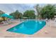 Outdoor swimming pool surrounded by lounge chairs and umbrellas at 705 S Alton Way # 6B, Denver, CO 80247