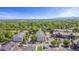 An aerial view shows the community landscaping and building layout at 10784 W 63Rd Pl # 205, Arvada, CO 80004