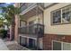 Exterior view of an apartment featuring brick and siding and balcony area at 10784 W 63Rd Pl # 205, Arvada, CO 80004