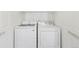 Modern laundry machines featuring a washer and a dryer at 10784 W 63Rd Pl # 205, Arvada, CO 80004