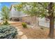 Backyard with a deck, outdoor seating, and landscaping for a relaxing outdoor space at 9530 Gray St, Westminster, CO 80031