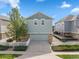 Charming two-story home featuring a tidy front yard, an attached garage, and neutral paint at 9530 Gray St, Westminster, CO 80031