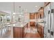 Spacious kitchen featuring stainless appliances, granite countertops, and a center island, perfect for entertaining guests at 9530 Gray St, Westminster, CO 80031