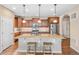 Beautiful kitchen featuring granite countertops, stainless appliances, and ample cabinet space at 9530 Gray St, Westminster, CO 80031