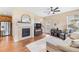 This open-concept living area has a fireplace and lots of space for furniture at 9530 Gray St, Westminster, CO 80031