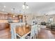 Bright open floorplan with kitchen island, dining area, and living space at 9530 Gray St, Westminster, CO 80031