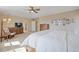 Comfortable main bedroom featuring neutral walls and carpet, fan, and warm natural light at 9530 Gray St, Westminster, CO 80031