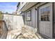 View of an outdoor deck with siding and a door at 12031 E Ford Cir, Aurora, CO 80012