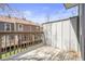 Wooden deck with railing overlooks backyard at 12031 E Ford Cir, Aurora, CO 80012