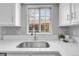 Bright kitchen featuring a view from the window at 12031 E Ford Cir, Aurora, CO 80012