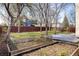 House exterior showing a fenced backyard with a patio and garden bed at 4565 Pussywillow Ct, Boulder, CO 80301