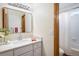 Clean bathroom featuring an undermount sink, marble countertop, and mirror at 4565 Pussywillow Ct, Boulder, CO 80301