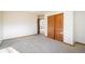Spacious, empty bedroom with soft carpet, baseboard trim, and natural light at 4565 Pussywillow Ct, Boulder, CO 80301