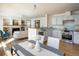 Bright kitchen with stainless steel appliances, white cabinetry, adjacent to Gathering room at 4565 Pussywillow Ct, Boulder, CO 80301