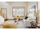 Inviting living room featuring a neutral color palette, hardwood floors, and plenty of natural light at 4565 Pussywillow Ct, Boulder, CO 80301