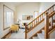 Bright and airy living room boasting large windows, a modern staircase, and comfortable seating at 4565 Pussywillow Ct, Boulder, CO 80301