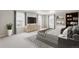 Comfortable bedroom featuring natural light, modern decor, and ample space at 13465 Valentia Pl, Thornton, CO 80602