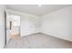 Bedroom featuring neutral carpet and access to other rooms at 13465 Valentia Pl, Thornton, CO 80602
