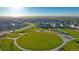 Neighborhood with a green central park featuring a playground at 13465 Valentia Pl, Thornton, CO 80602