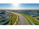 Planned neighborhood with street lined with trees and sidewalks at 13465 Valentia Pl, Thornton, CO 80602