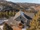 Aerial view of house showcasing mountain backdrop at 13326 Kuehster Rd, Littleton, CO 80127