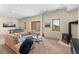 Finished basement with sectional couch, wood stove, pool table, and mountain views at 13326 Kuehster Rd, Littleton, CO 80127
