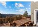 Deck with mountain views and outdoor dining furniture at 13326 Kuehster Rd, Littleton, CO 80127