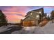 House exterior at dusk with mountain views at 13326 Kuehster Rd, Littleton, CO 80127