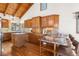 Well-appointed kitchen with granite countertops, custom cabinetry, and a center island at 13326 Kuehster Rd, Littleton, CO 80127