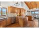 Stylish kitchen with granite counters, stainless steel appliances, and abundant natural light at 13326 Kuehster Rd, Littleton, CO 80127