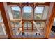 High-ceilinged living room with expansive mountain views at 13326 Kuehster Rd, Littleton, CO 80127