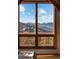 Spectacular mountain views seen through a large window at 13326 Kuehster Rd, Littleton, CO 80127