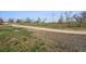 Scenic walking path surrounded by open space, ideal for recreation and enjoying nature at 7840 Ogden Ct, Denver, CO 80229