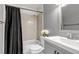 Bathroom features a bathtub with shower, modern vanity, and neutral wall color at 3354 S Flower St # 52, Lakewood, CO 80227