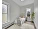 Cozy bedroom with bright windows, neutral decor, and a comfortable single bed at 3424 N Marion St, Denver, CO 80205