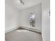 Neutral bedroom featuring a large window and natural light at 3424 N Marion St, Denver, CO 80205