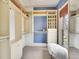 Spacious walk-in closet with custom shelving, drawers, and natural light at 3424 N Marion St, Denver, CO 80205