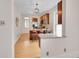 Well-lit kitchen with granite countertops, breakfast bar seating, and modern stainless steel appliances at 3424 N Marion St, Denver, CO 80205