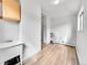 Bright and airy laundry room area with sink at 3424 N Marion St, Denver, CO 80205