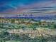 Expansive estate exterior showing Denver skyline, a sprawling landscape, and beautiful home; perfect for luxury living at 15175 W Belleview Ave, Morrison, CO 80465