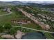 Stunning modern home with a pool nestled against a dramatic rock formation and mountain views at 15175 W Belleview Ave, Morrison, CO 80465