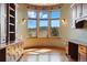 Living room with custom millwork, and large windows offering scenic views at 15175 W Belleview Ave, Morrison, CO 80465