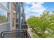 Enjoy tree-lined street views from the balcony, showcasing the vibrant neighborhood at 2680 Blake St # 4, Denver, CO 80205
